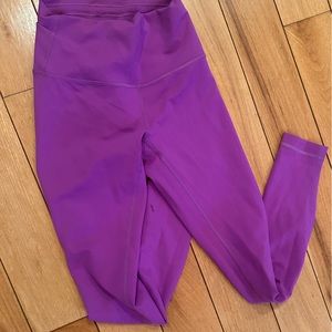 Bright purple lululemon base pace tights 28”